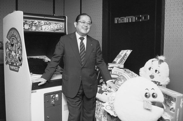 Video Game Designer Masaya Nakamura Posing with His Creations