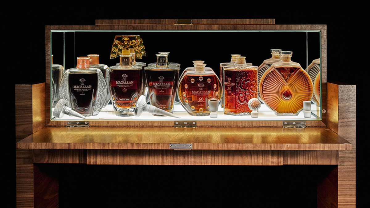 the macallan 50 year lalique edition six pillars collection in bespoke cabinet