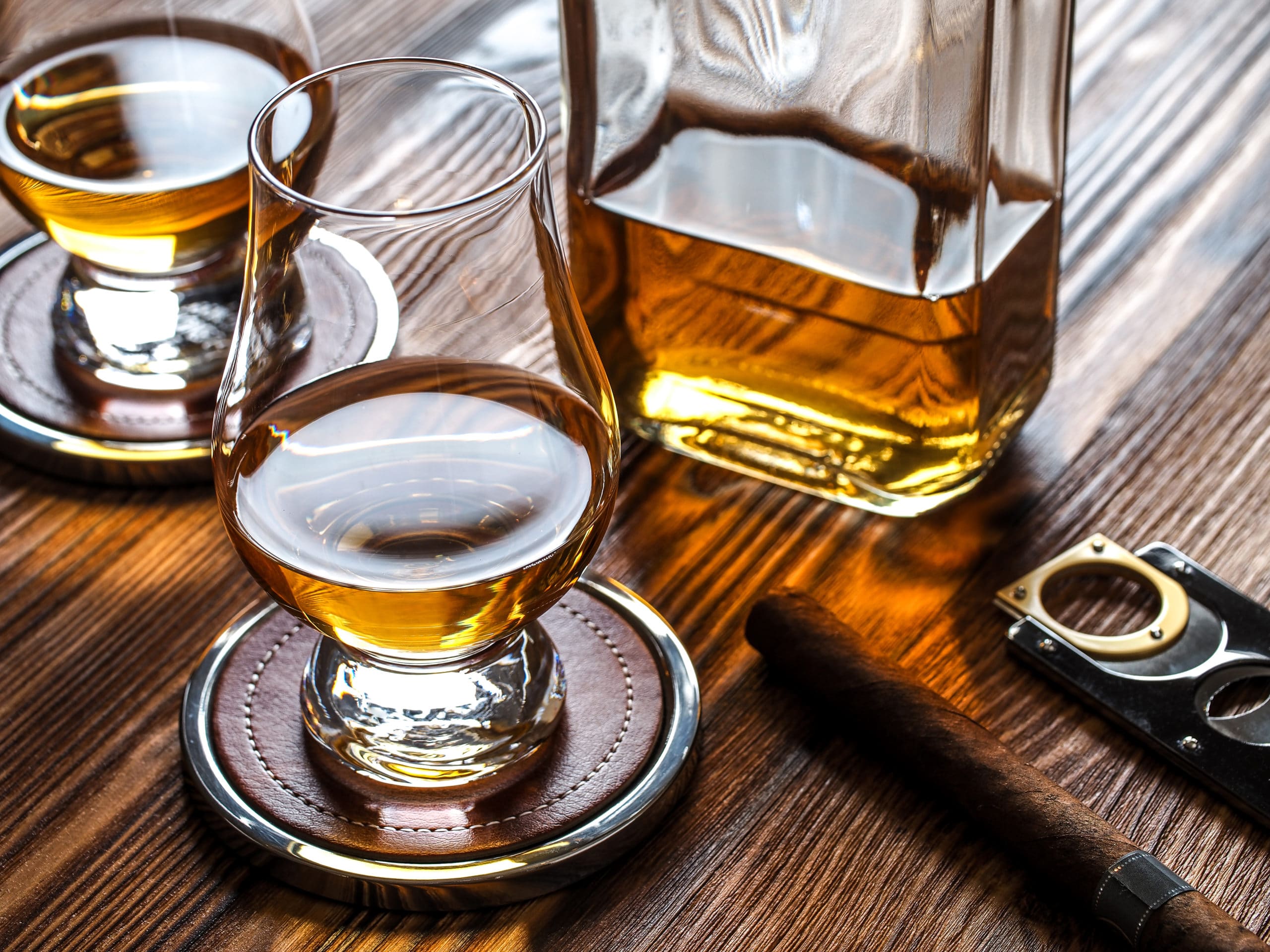 two glencairn glasses of whisky