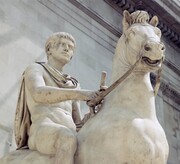 Λέγεται πως έκανε το άλογό του Ύπατο της Ρώμης. Στην πραγματικότητα ωστόσο πρόκειται για σατιρική απόφαση επειδή είχε πρόθεση να κάνει ύπατο τον θείο του Κλαύδιο, ο οποίος είχε αποτραβηχτεί από τα κοινά. Κάποιος είχε σχολιάσει ότι θα ήταν καλύτερο να έκανε το άλογό του ύπατο με αποτέλεσμα να παρθεί η περιβόητη απόφαση.