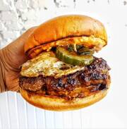 KOREA: You can dabble in some Korean BBQ with a meat patty cooked in bulgogi sauce with muchim, kimchi mayo and a fried egg or give K-POP a try with some sriracha buttermilk fried chicken tossed in a sweet and spicy gochujang sauce with sesame seeds and kimchi mayo.


