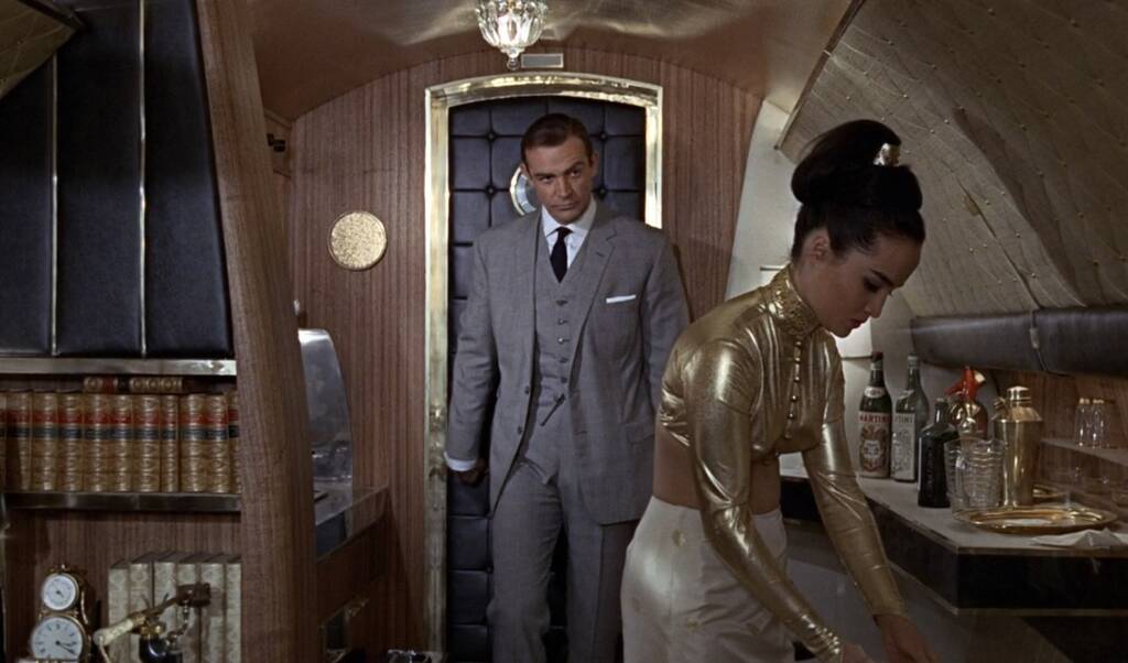 Mei-Lei: “Can I do anything for you, Mr. Bond?”

Bond: “Oh, just a drink. A martini, shaken, not stirred.”