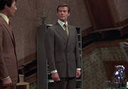 The Man With The Golden Gun (1974)
Double-Breasted Olive Suit